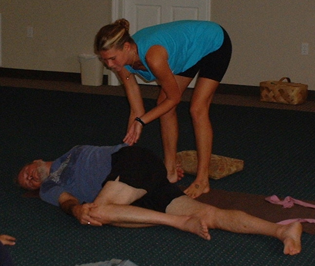 Erin assists Spinal Twist